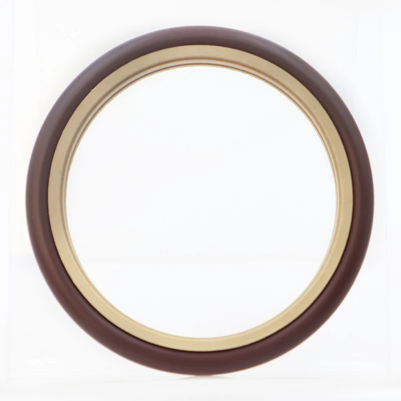 Tenuta composta di tipo a labirinto per alberi rotanti